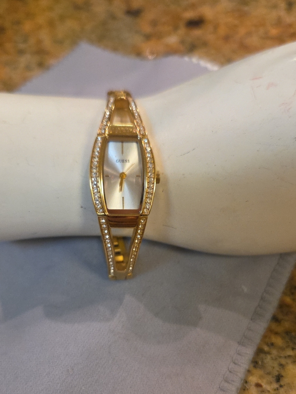 GUESS Gold Crystal-Accented Bangle Watch with Mother-of-Pearl Dial